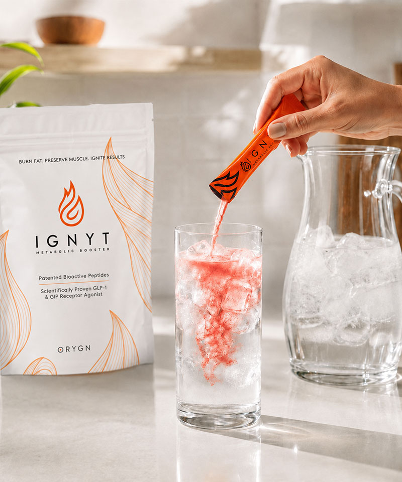 IGNYT bag with a stick pouring into an iced glass of water